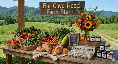 Bat Cave Road Farmstand in Old Fort, NC — fresh seasonal vegetables, sourdough bread, farm eggs, local honey, homemade jams, and cut flower bouquets with the Blue Ridge Mountains in the background
